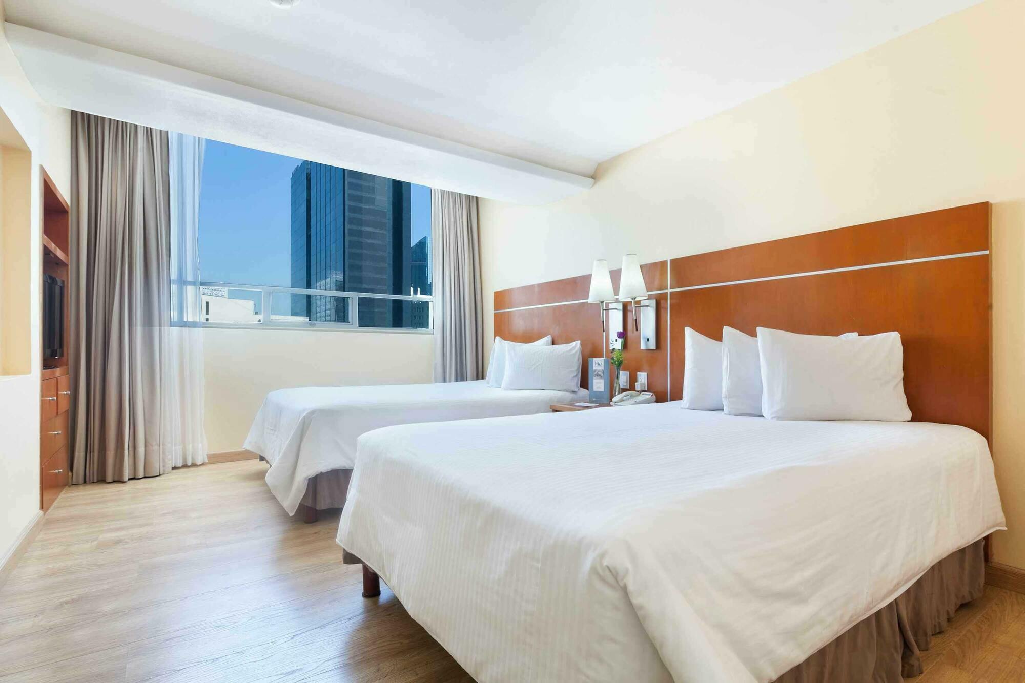 Eurostars Zona Rosa Suites Мехіко Екстер'єр фото A room at the hotel
