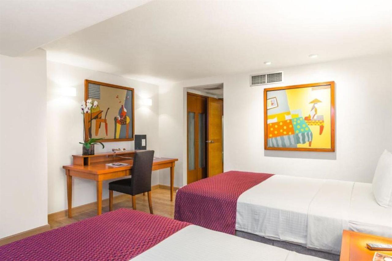 Eurostars Zona Rosa Suites Мехіко Екстер'єр фото A room at the hotel